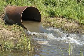 An exit pipe with flowing dirty water